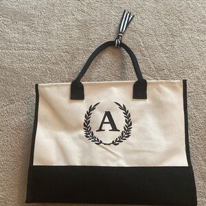 NWOT Canvas black and cream A tote bag and makeup bag